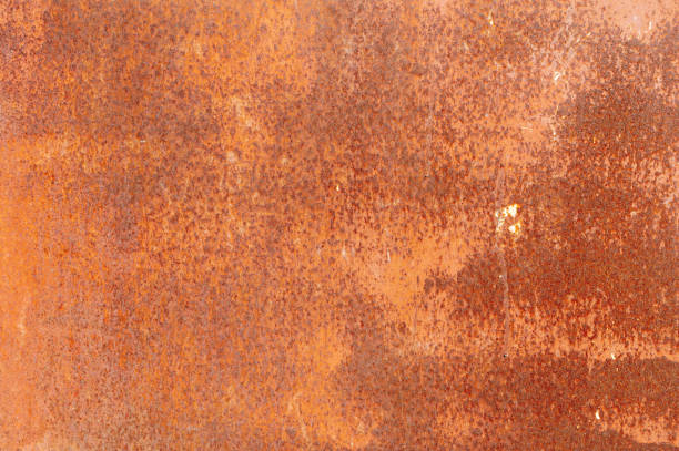 istock Textured grunge background red peeling paint with rust on old metal surface 1311094035