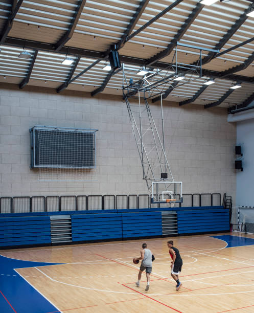 istock A Game of Hoops: Two Young Men Playing Basketball One-on-One (Copy Space) 1311096993