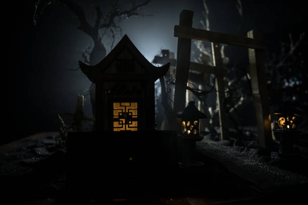 istock Creative artwork decoration. Abstract Japanese style wooden tunnel at night. Selective focus 1311097507
