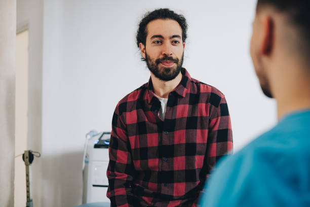 istock Athlete In Conversation with the Physical Therapist After Treatment 1311098299