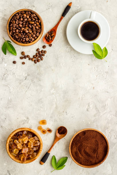 istock Black coffee espresso with coffee beans, top view 1311100017
