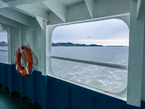 Sea view from the ship porthole. Travel concept