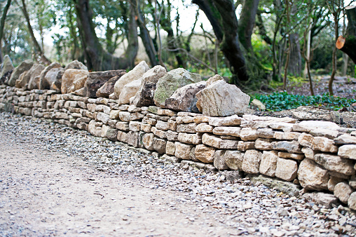 Dry stone wall under construction on the Isle of Purbeck along the Jurassic Coast in Dorset, England
