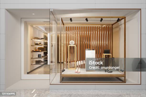 Exterior Of Clothing Store With Shoes And Other Accessories Displaying In Showcase Stock Photo - Download Image Now
