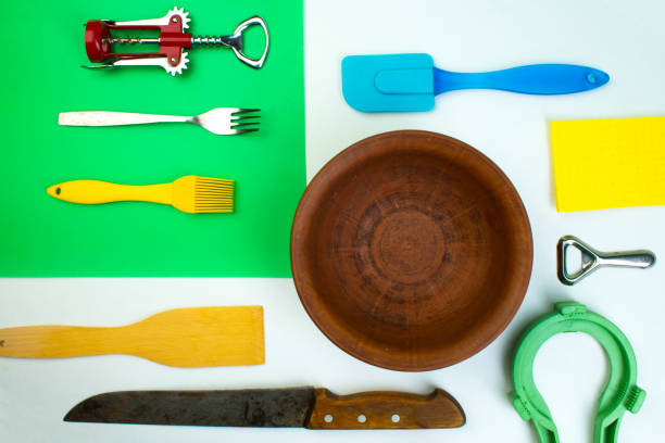 istock Background of kitchen utensils on white wooden kitchen table. tools. Top view. 1311108049