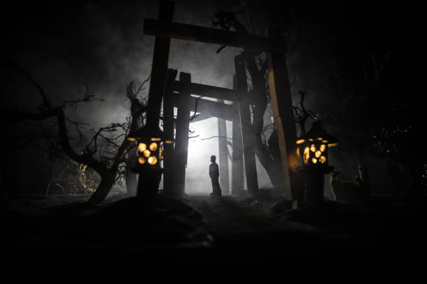 istock Creative artwork decoration. Abstract Japanese style wooden tunnel at night. Selective focus 1311108368