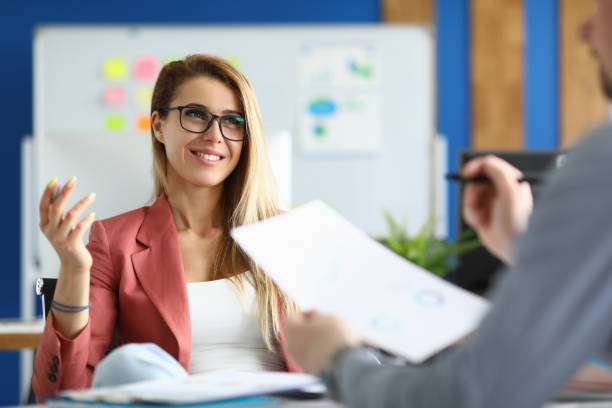 istock Business partners communicate in office at working table 1311109928