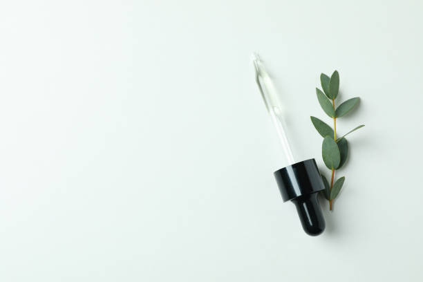 istock Pipette with oil and eucalyptus twig on white background 1311115142