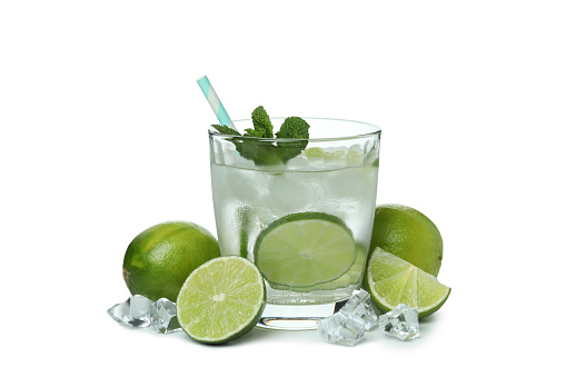 Glass of mojito cocktail and ingredients isolated on white background