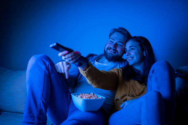 istock couple watching film at night 1311119782