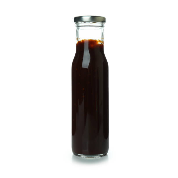 istock Bottle of barbecue sauce isolated on white background 1311121249