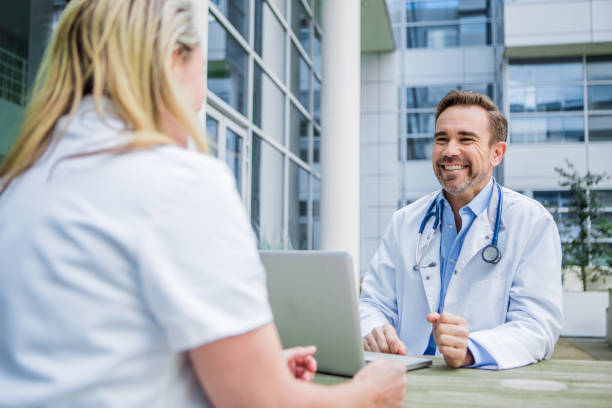 istock Two doctors on a medical campus 1311123578