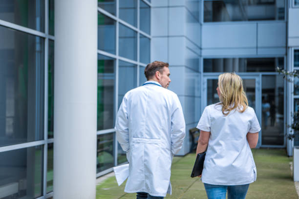 istock Two doctors on a medical campus 1311123696