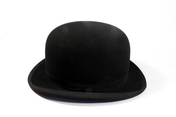 istock A Mans Black Bowler Hat on White Background 1311126019