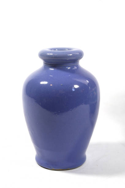 istock A Vintage Cup or Jar Vase On A White Background for Decoration 1311126022