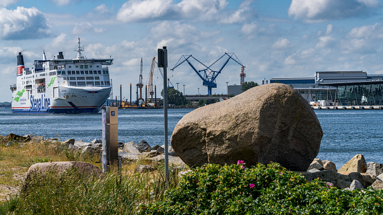 Rostock, Mecklenburg-Western Pomerania, Germany - June 14, 2020: A Stena line ferry passing Warnemuende on the way to Trelleborg