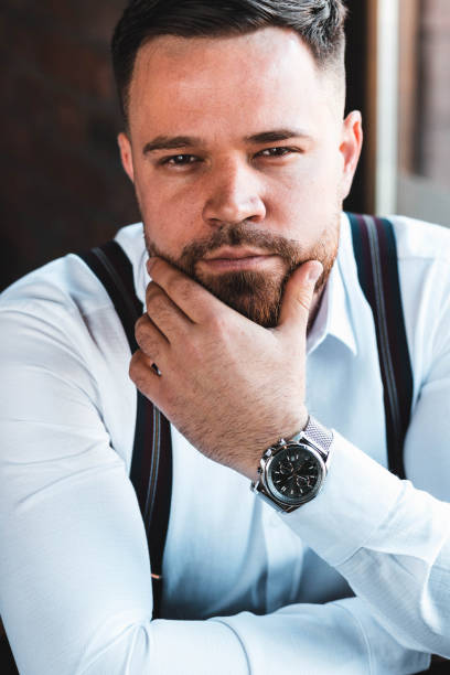 istock Portrait of a young businessman thinking 1311130963