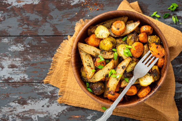 istock Baked vegetables in a wooden bowl 1311131762