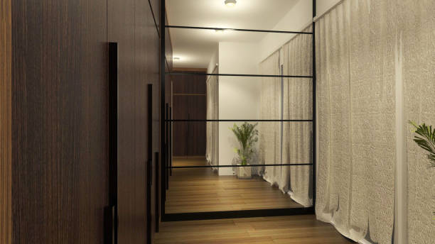 istock Fitting Room With Wooden Wardrobe Clothes And Wall Mirror Paneling 1311132872