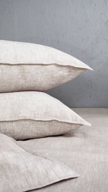 istock Pillows and duvets on the bed with 100% linen bedding. 1311134594