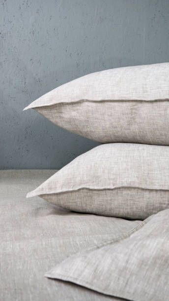 istock Pillows and duvets on the bed with 100% linen bedding. 1311134614