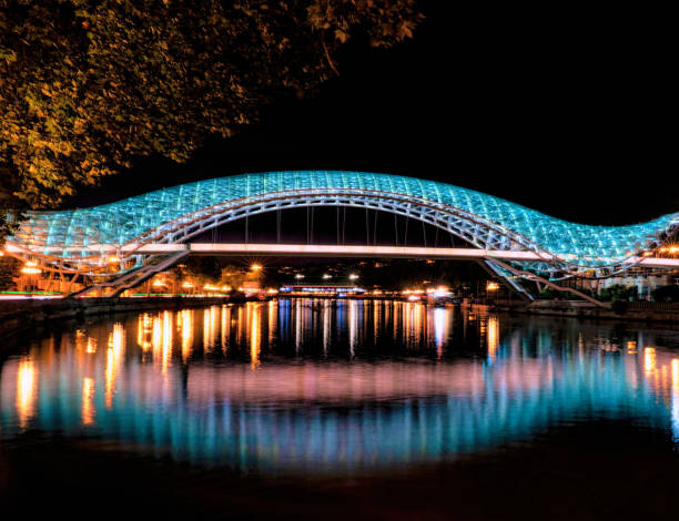 istock Bridge of Peace in Tbilisi at night 1311135595