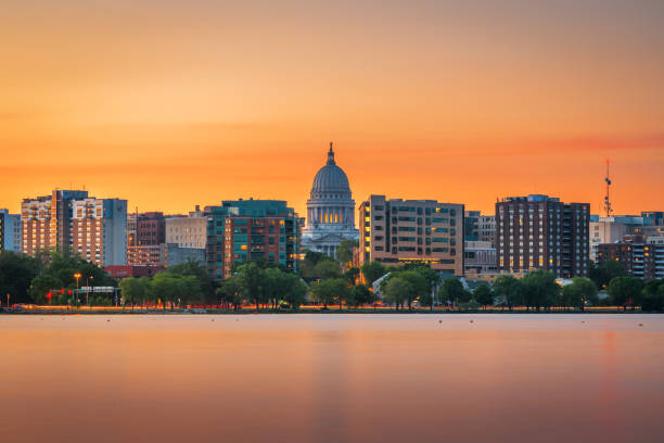 Madison, Wisconsin, USA downtown Skyline on Lake Monona. Madison, Wisconsin, USA downtown skyline at dusk on Lake Monona. lake monona photos stock pictures, royalty-free photos & images