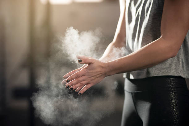 istock Unrecognizable sportswoman getting ready for deadlift training in the gym 1311139874