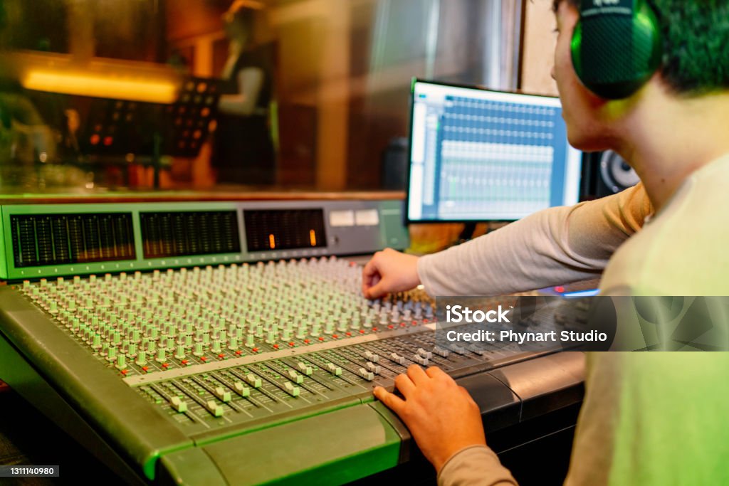 Sound Engineer Photo Lab Sound Engineer Working At Mixing Panel In The Recording Studio Stock ...