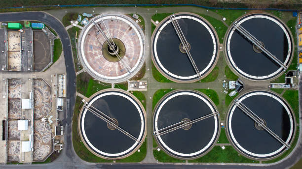 istock Large sewage treatment plant - aerial view 1311141579