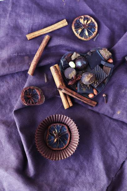 istock Chocolate, sweets and spices on linen fabric 1311144021