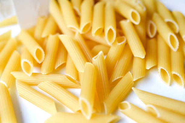 Cooked pasta on fork