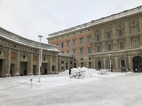 Stockholm, Sweden - February 3, 2019: The Swedish Royal Palace covered in snow during winter