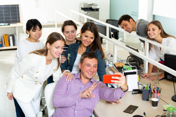 istock successful interracial business team making selfie 1311147624