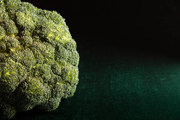 istock fresh broccoli on a green suede background 1311148662