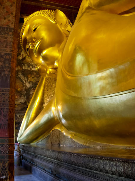istock Buddha statue is large gilded. A place of Buddhist worship. 1311148874