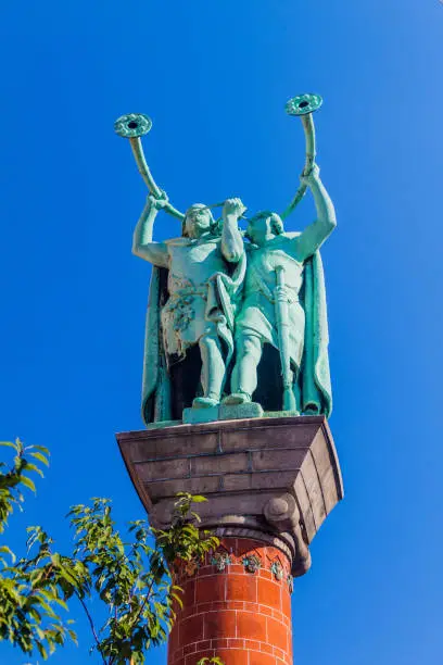 COPENHAGEN, DENMARK - AUGUST 26, 2016: Lur blowers statue at City Hall Square in Copenhagen, Denmark