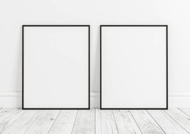 istock Double 8x10 Vertical Black Frame mockup on white wooden floor and white wall. 1311165667