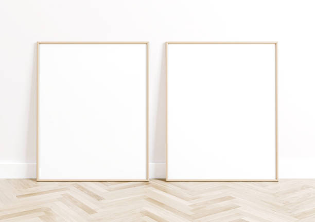 istock Double 8x10 Vertical Beige Frame mockup on bright wooden floor and white wall. 1311165843