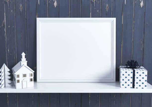 istock Single 8x10 Horizontal White Frame mockup with Christmas decorations on white glossy shelf and dark blue vintage wooden wall. 1311165961