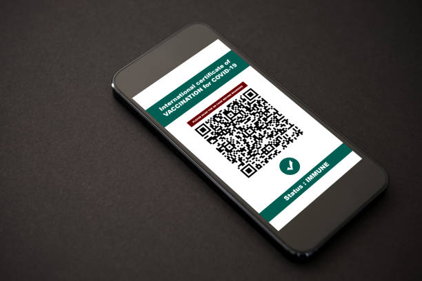 istock certificate of vaccination on the smartphone 1311166026