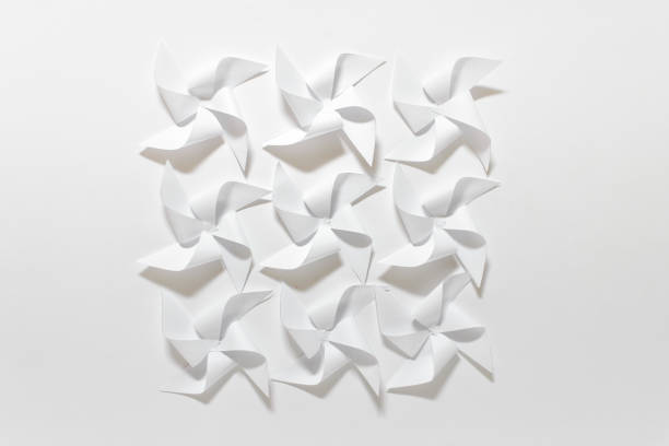 istock Handmade origami paper composition with nine white flowers 1311168208