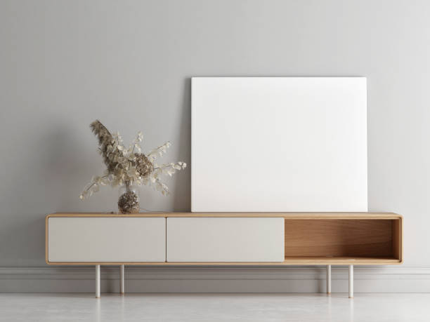 istock Empty poster on a wooden drawer, minimal composition with decoration. 1311170791