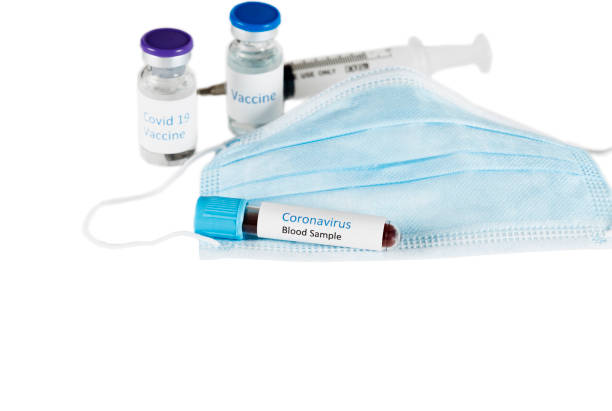 istock Coronavirus Blood Sample with disposable face mask 1311170871