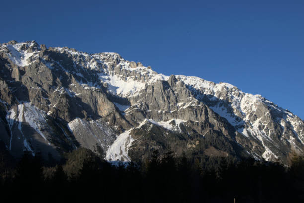 istock Snow capped mountains - alps 1311171665