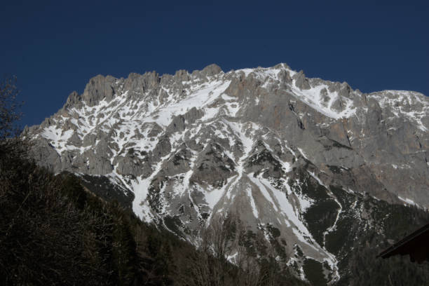 istock Snow capped mountains - alps 1311173079