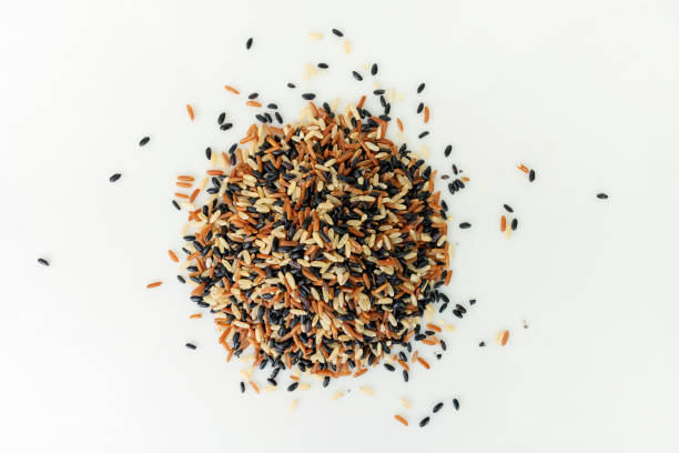 Mix of white, red and black rice, top view, close up.