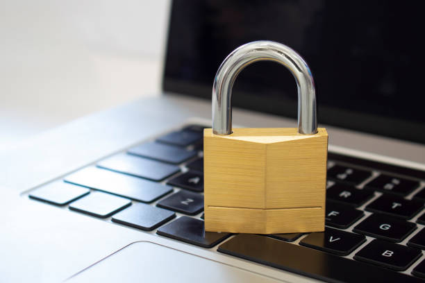 istock A lock on top a computer keyboard. Concept: cybersecurity, protection of computer systems and networks from information disclosure. 1311179998