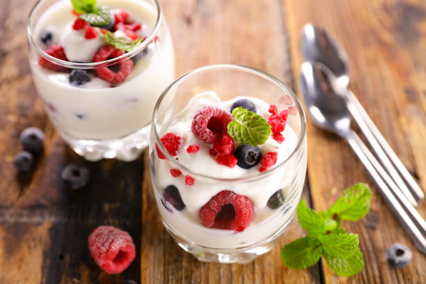 istock yogurt with fresh fruits on wood background 1311191124