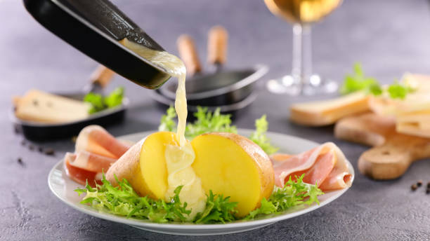 istock raclette cheese with potato and ham 1311191136